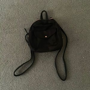 I am selling a cute black bag for $17.60. It is for kids and adult ladies